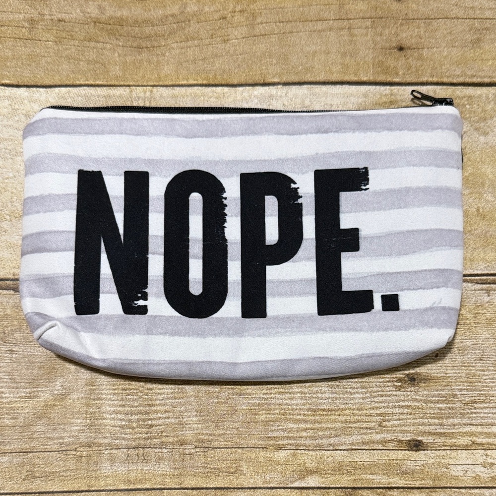 Striped Gray and White Pouch with 'NOPE' Print